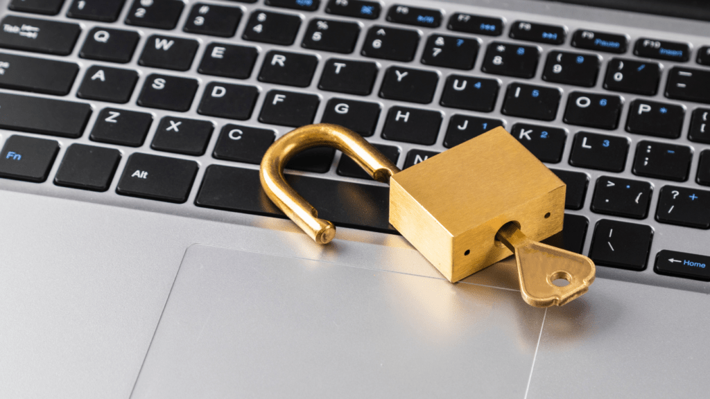 a padlock sitting on a laptop