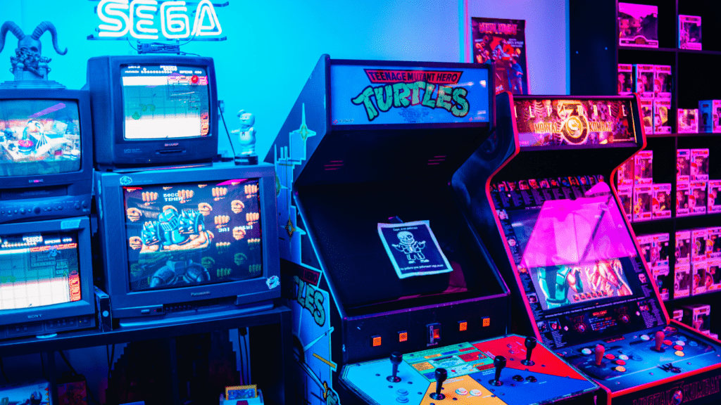 a row of arcade machines in a game room