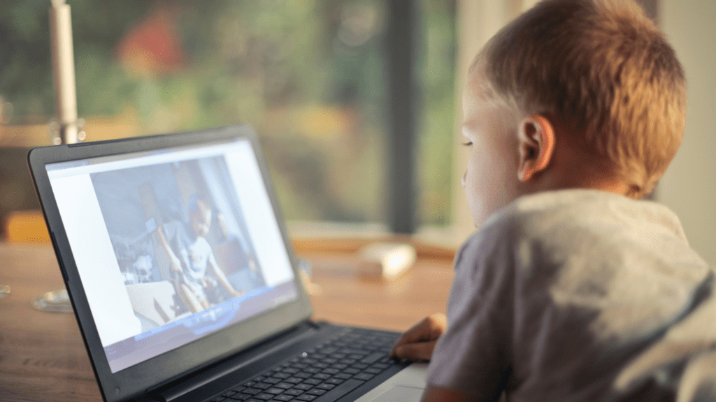 image of child in front of laptop