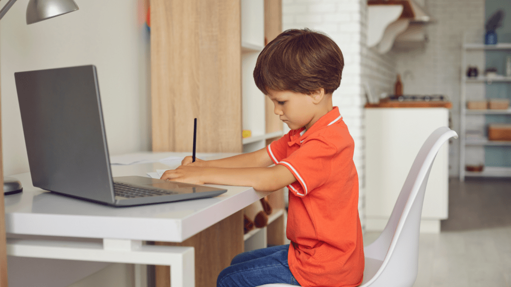 image of child in front of laptop